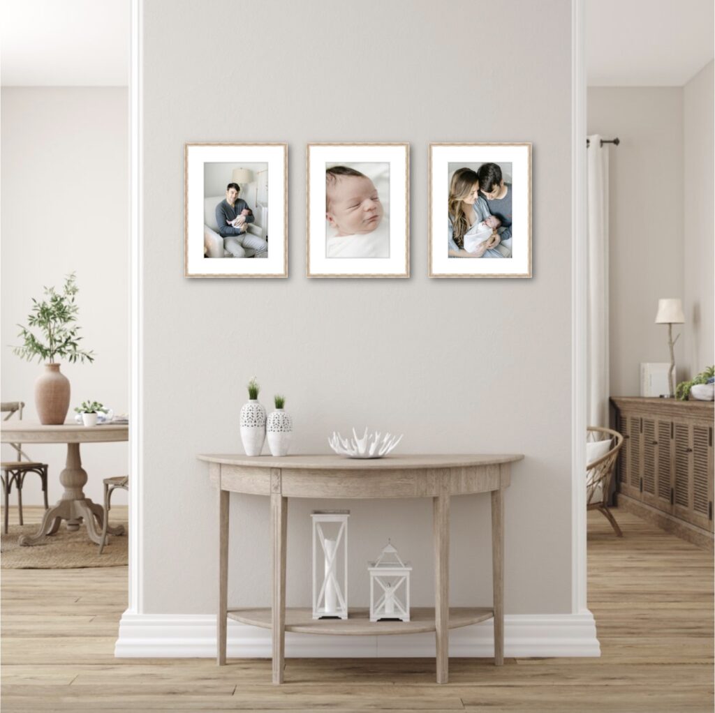 Gallery wall of 3 white oak custom frames showcasing images from their newborn session